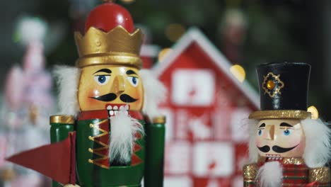 Wooden-Tree-Advent-Calendar-in-Front-of-a-Real-Christmas-Tree-Decorated-Nutcracker-Soldier-Toys