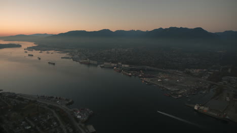 Aerial-wide-shot-of-Burrard-inlet-in-Vancouver,-Dusk