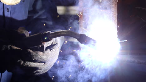 A-close-up-of-a-welder's-hands