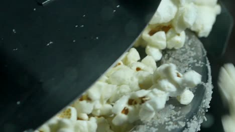 popcorn-popping-from-a-popcorn-machine-close-up