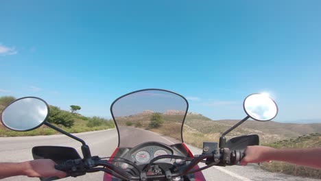 Riding-a-motorcycle-on-Penteli-mountain-in-Greece