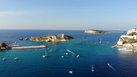 Drone-Pan-left-above-Tremiti-islands-during-a-clear-sky-sunset