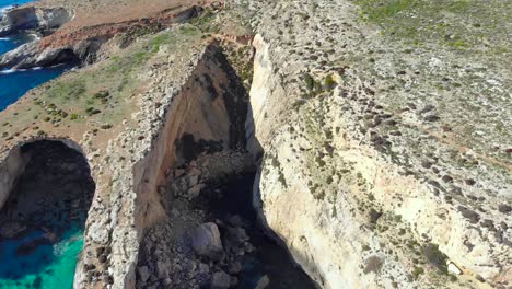 Drone-shot-over-rocks-in-nature-over-rocks---the-Mediterranean-sea-of-Malta