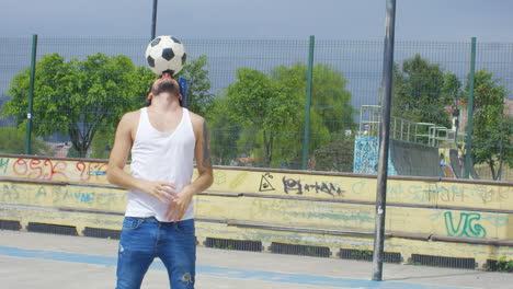 Handsome-man-practicing-soccer-tricks