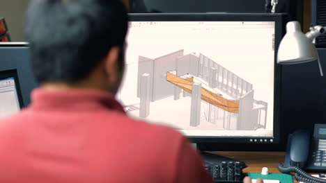 Architect-modelling-a-building-on-his-computer