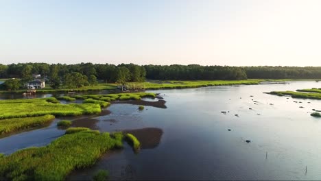 Rising-shot-of-drone-flying-over-Calabash-River-near-downtown-Calabash-NC-at-sunrise