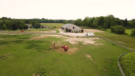 Aerial-view-of-a-large-horse-farm-and-stable