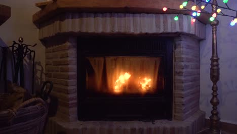 Fireplace-with-a-christmas-tree-on-the-top-right-of-the-frame
