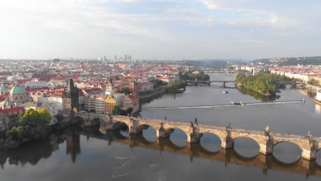 Aerial-view-to-Vltava-river-and-Charles-Bridge,-Prague,-Czech-Republic