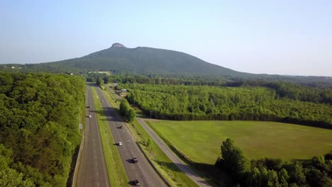 US-Route-52-in-foreground-with-Pilot-Mountain-looming-in-background