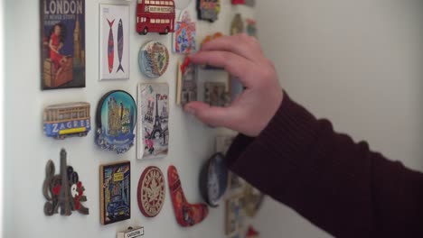Souvenir-magnets-from-different-places-from-around-the-world-on-a-fridge-at-home