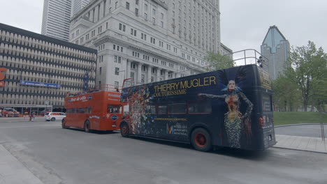 Editorial,-4K-view-of-Therry-Mugler,-tourists-bus-in-street