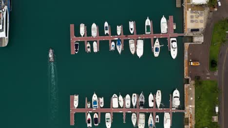 Birds-eye-view-of-tropical-island-harbour-with-boats