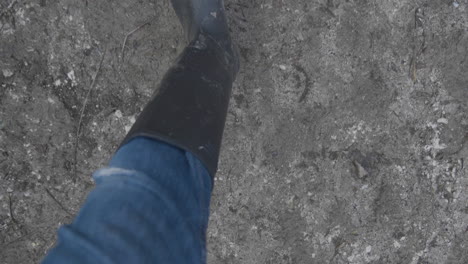Muddy-boots-running-down-muddy-path