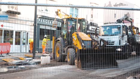 Construction-workers-and-bulldozer-repaving-Doncaster-town-centre
