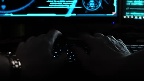 Close-up-of-the-hands-of-a-hacker-cyber-criminal,-typing-rapidly-on-a-keyboard