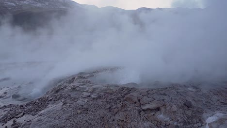 Slow-motion-El-Tatio-geysers-boiling-and-steaming-in-the-Atacama-desert-in-Chile,-South-America