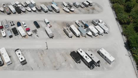 backward-drone-aerial-over-storage-lot-for-boats-and-campers