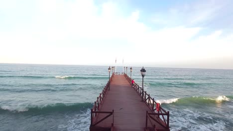 flying-over-wooden-pier-in-marbella-malaga-spain