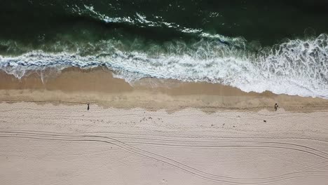 Top-Down-Aerial-Shot-Of-Foamy-Green-Waves-Of-half-moon-bay-beach-fly-up