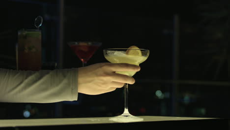 Female-Bartender-Serving-Alcoholic-Ladies-Drink
