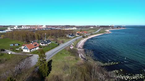 Aerial-Shot-of-a-Town-in-South-Sweden-Skåne-Near-The-Ocean-Östersjön