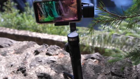 An-iPhone-XS-camera-mounted-to-a-Zhiyun-Smooth4-Gimbal-to-help-create-clear,-stable,-and-smooth-footage-for-travel-and-landscape-cinematography
