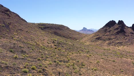 Aerial-pan-across-an-iconic-Southwestern-landscape,-Salt-River-Indian-Reservation,Scottsdale,-Arizona