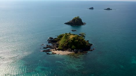 Wide-aerial-shot-of-small-filipino-islands-of-Nacpan-beach,-El-Nido-,-Palawan,-Philippines