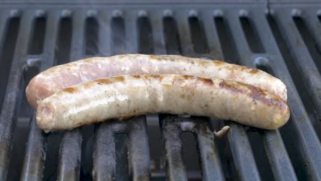 Fresh-german-sausages-on-the-BBQ-grill,-Barbecue-in-Germany