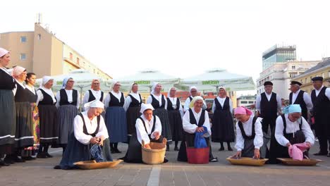 Folk-dance-group-performs-a-show-for-tourists-in-Zagreb,-Croatia