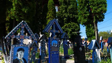 Tilt-up-shot-of-the-"merry-cemetery"-and-his-church,-in-Sapanta,-Romania