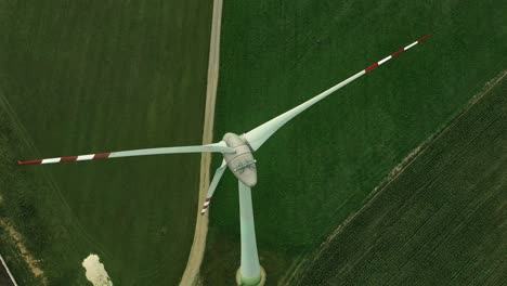 Drone-view-of-a-wind-turbine-and-the-surrounding