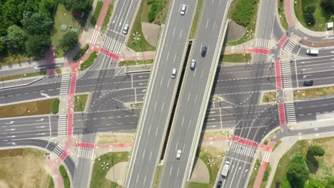 Summer-aerial-footage-of-transport-junction,-traffic-cross-road-junction-day-view-from-above-with-highway-road