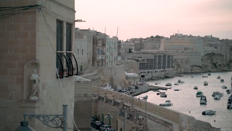 Old-buildings-with-a-view-of-the-harbour-of-the-Three-Cities-in-Malta