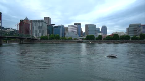 Boater-enjoying-the-Willamette-River-and-downtown-Portland-Oregon-from-the-Eastside-Esplanade