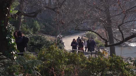 Central-Park-Pond-Area-With-People-Walking-on-Path-During-Christmas-Holiday-Time