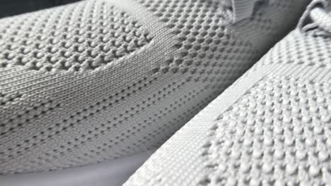 Closeup-dolly-right-sports-unbranded-woven-grey-white-comfortable-trainers