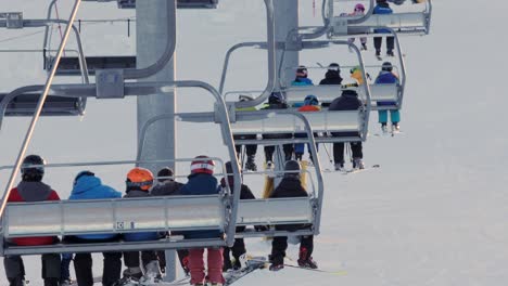 Chairlift-brings-skiers-and-snowboarders-to-the-hilltop-at-COP-Calgary