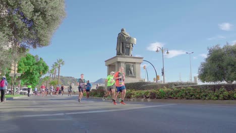 A-group-of-marathon-runners-on-sunny-day-in-Malaga,-Costa-del-Sol