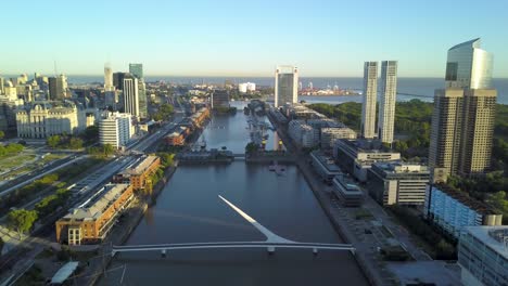 Aerial-descending-over-Puerto-Madero-neighborhood-at-sunrise-in-Buenos-Aires