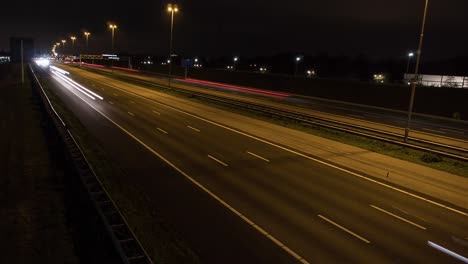 Car-lights-at-night-on-highway-time-lapse,-still-shot