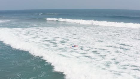 Acapulco-Mexico-Beach,-Surfers-With-Boards-Waiting-For-Good-Waves,-Aerial-View
