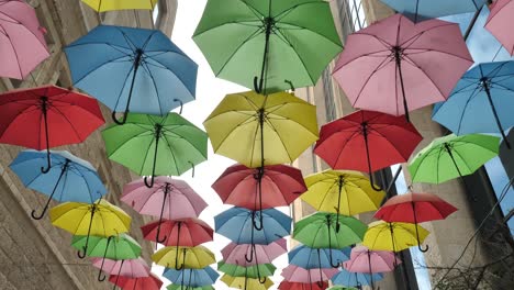 Relaxing,-romantic-walk-under-shade-of-colorful-umbrellas-on-Jerusalem-street