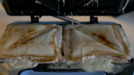 close-up-of-a-Grilled-Cheese-Toaster-Sandwich-Maker-Bread-Breakfast-Cheese