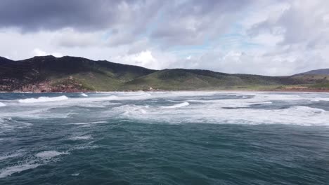 waves-run-in-the-beautiful-bay-of-porto-ferro