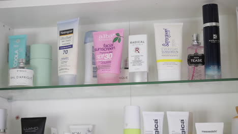 High-End-Beauty-and-Self-Care-Products-in-Female-Bathroom-Medicine-Cabinet