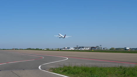 Aircraft-Taking-Off-from-Runway,-Sunny-Day.-Static