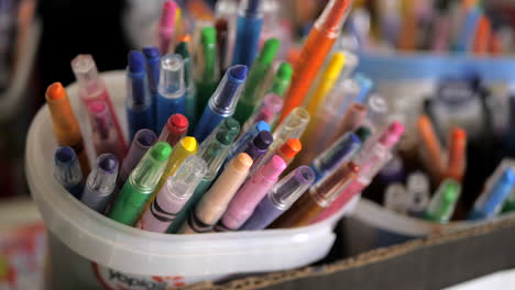 DOLLY-IN-to-focus-On-Colored-Art-Pencils-In-A-Container
