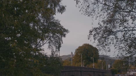 Handheld-shot-of-the-Old-Stirling-Bridge-and-the-National-Wallace-Monument-on-background-in-UK